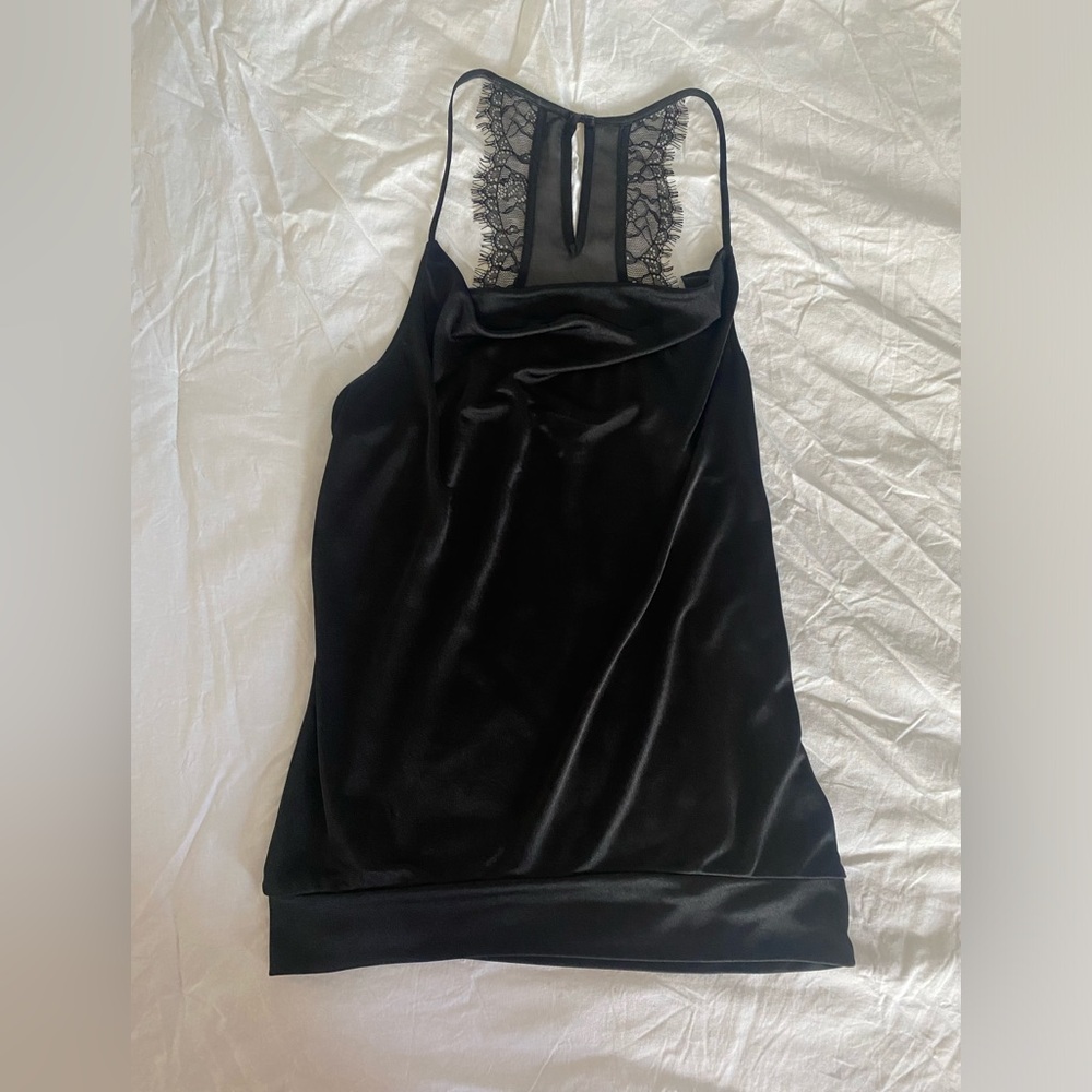 Lace back top with a drappy neck